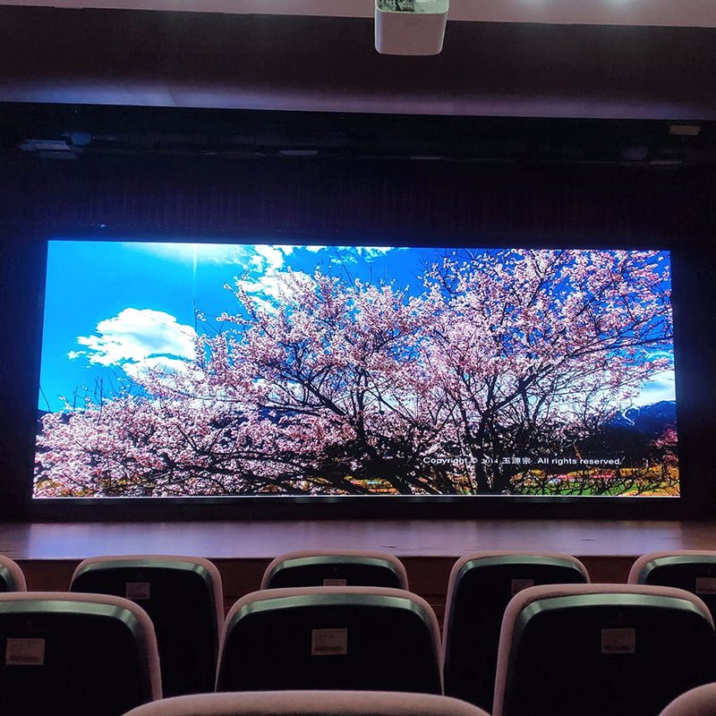 Indoor LED display in an auditorium with seated viewing positions